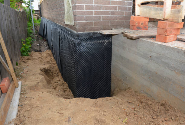 SJ Waterproofing Pros technician performing targeted Waterproofing assessment in Round Hill, VA